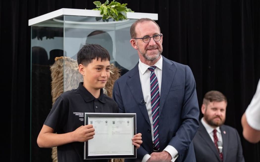 Tipene Capper receives one of 17 land titles returned by Treaty Negotiations Minister Andrew Little