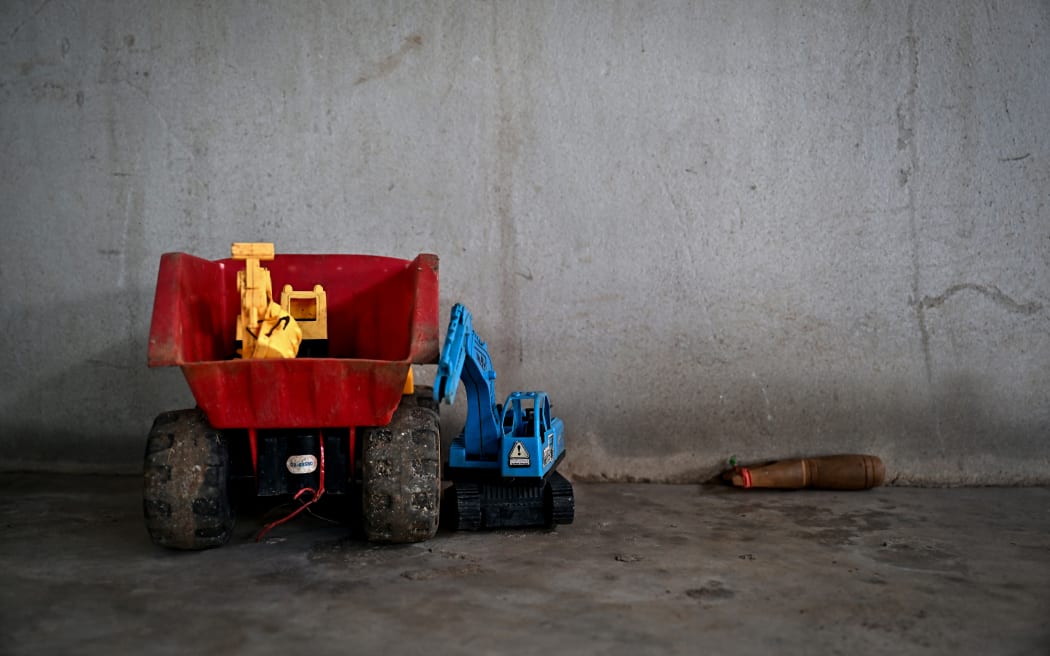 Toys belonging to three-year-old Nannaphat "Stamp" Songserm, who was killed in the mass shooting at his nursery, are seen outside his home in Na Klang in Thailand's northeastern Nong Bua Lam Phu province on October 8, 2022.