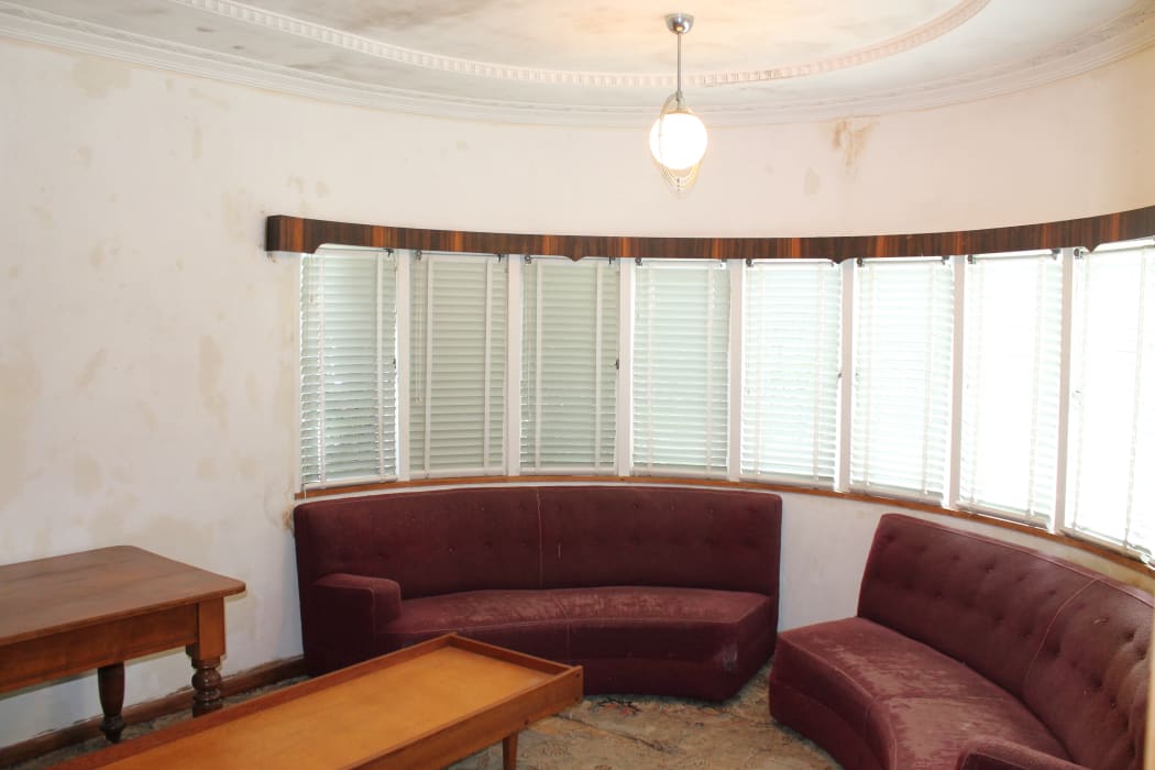 One of the original Art Deco lights in the feature bay window.