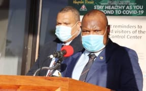 Papua New Guinea's Prime Minister James Marape (right) with the Controller of the National Pandemic Response, Police Commissioner David Manning.