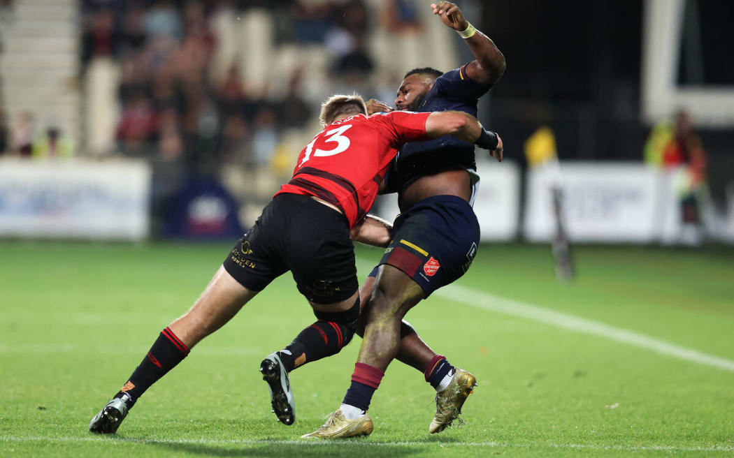 Braydon Ennor tackles Timoci Tavatavanawai.