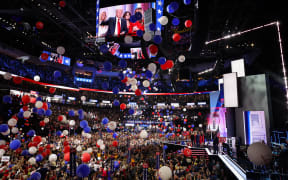 MILWAUKEE, WISCONSIN - JULY 18: Balloons fall after Republican presidential nominee, former U.S. President Donald Trump officially accepted the Republican presidential nomination on the fourth day of the Republican National Convention at the Fiserv Forum on July 18, 2024 in Milwaukee, Wisconsin. Delegates, politicians, and the Republican faithful are in Milwaukee for the annual convention, concluding with former President Donald Trump accepting his party's presidential nomination. The RNC takes place from July 15-18.   Scott Olson/Getty Images/AFP (Photo by SCOTT OLSON / GETTY IMAGES NORTH AMERICA / Getty Images via AFP)