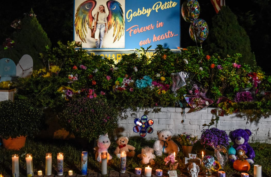 BLUE POINT, NY - SEPTEMBER 24: A sign at a roadside memorial honors the death of Gabby Petito on September 24, 2021 in Blue Point, New York.