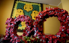 Poppies pinned on by the descendants of Cook Island soldiers.
