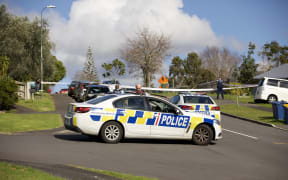 Officers at the scene of a police shooting in Massey, Wellington, 19 June 2020.