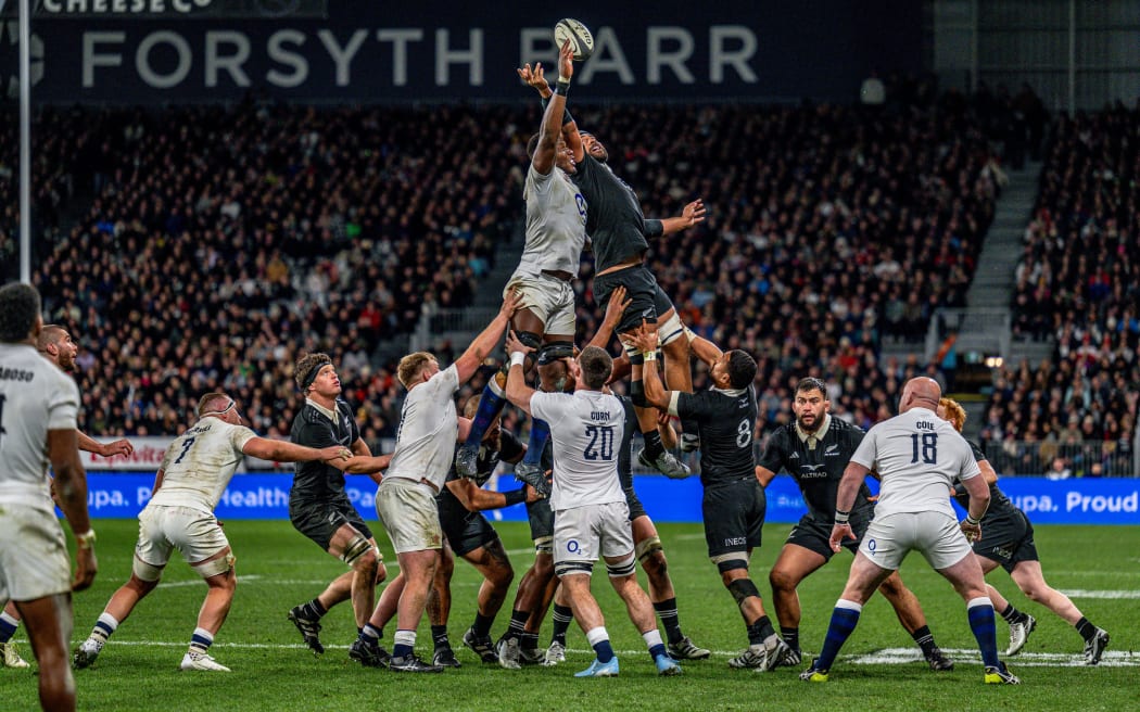 Patrick Tuipulotu of the All Blacks contests a lineout.