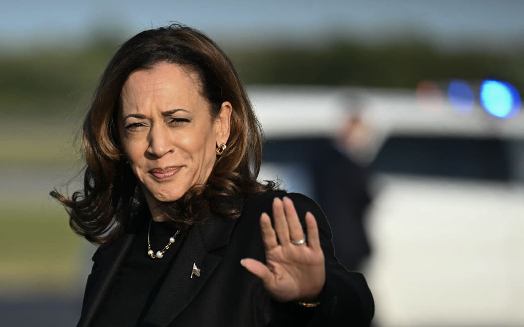 US Vice President and Democratic presidential candidate Kamala Harris waves as she arrives at Philadelphia International Airport in Philadelphia, Pennsylvania, on September 9, 2024. Harris and former US President and 2024 Republican presidential candidate Donald Trump will participate in a televised debate in Philadelphia on September 10. (Photo by Jim WATSON / AFP)