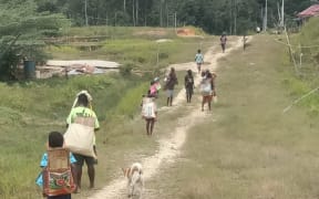 West Papuan villagers flee their homes due to armed conflict in Maybrat regency, September 2021.