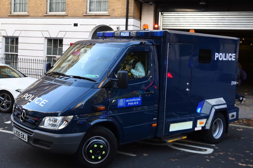 A Metropolitan Police van believed to be containing Ali Harbi Ali, leaves the back of Westminster Magistrates' Court in London on October 21, 2021.