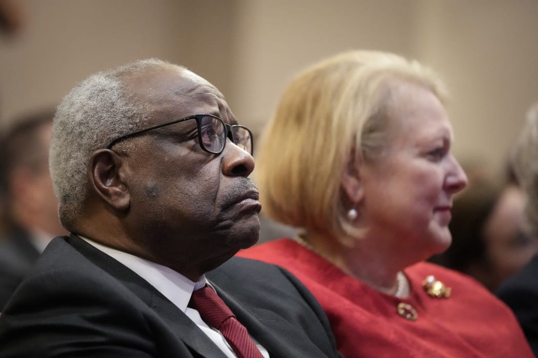 US Justice Clarence Thomas and his wife Virginia Thomas in October 2021.