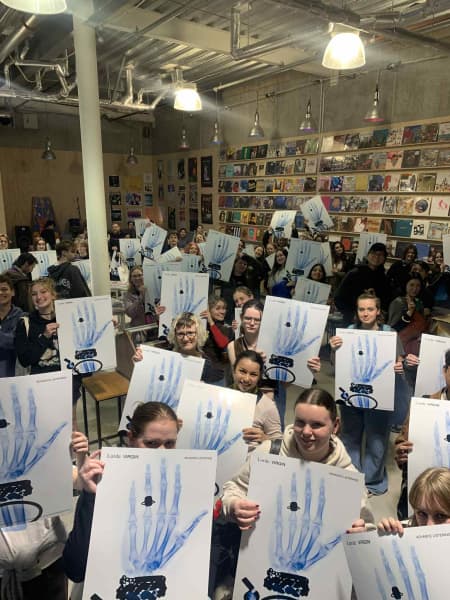 The first 80 people through the door of the event were given a Lorde album poster.