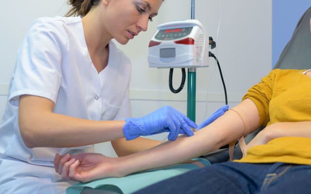Woman having chemotherapy treatment