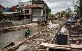 Flash flooding carried an enormous amount of trash and debris through Bali's waterways.  (