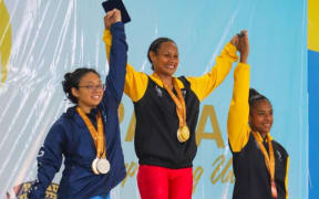 PNG’s weightlifting queen, Dika Toua, has claimed 2 Gold and 1 Silver in the Women’s 53kg category on 2 July.