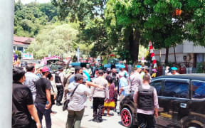 A public vigil led by the West Papua Council of Churches is stopped by Indonesian security forces, 16 August 2021