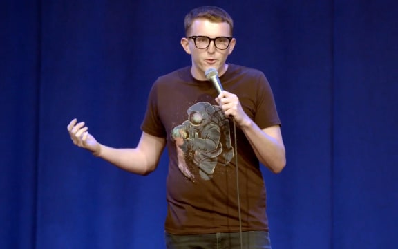 Josh Davies performs his stand-up routine at Q Theatre.