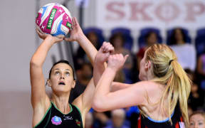 West Coast fever player Natalie Medhurst shoots against the Mainland Tactix.