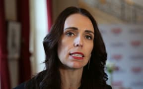Prime Minister Jacinda Ardern speaks to media in France after the Christchurch Call summit.