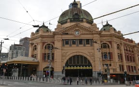 MELBOURNE, AUSTRALIA - APRIL 28: People are seen at the city centre after streets and roads remain nearly empty following a great number of shops are being closed within coronavirus (COVID-19) restrictions in Melbourne, Australia on April 28, 2020.