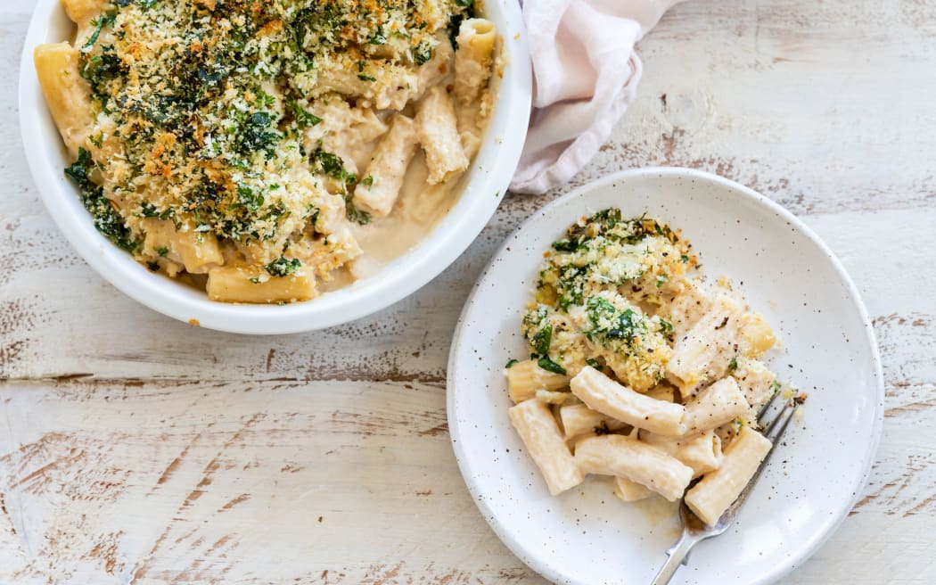 Mac n cheese with cauli sauce and a spinach herb crumb