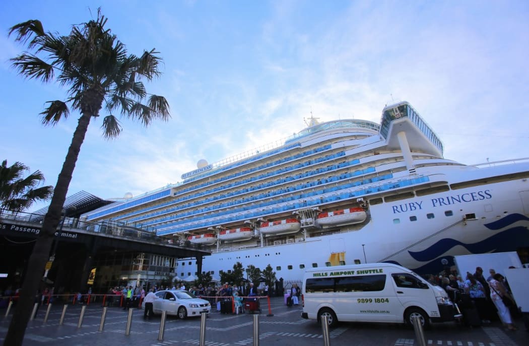 SYDNEY, AUSTRALIA - MARCH 19: The Ruby Princess cruise ship is seen docked at at the Overseas Passenger Terminal, days after Australian Prime Minister Scott Morrison announced that international cruise ships would no longer be allowed to dock at Australian ports.