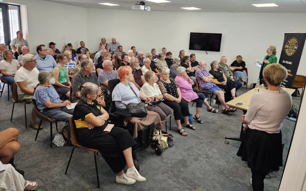 Residents listening to Ecogas and Christchurch City Council representatives giving an in-depth presentation about the new organics processing plant at a public meeting in Hornby 28 January, 2024.