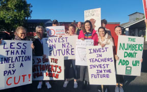 Striking secondary school teachers picketing outside Selwyn College in Auckland on Wednesday, 29 March.