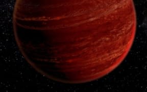 An artist's impression of an auroral display on a brown dwarf.