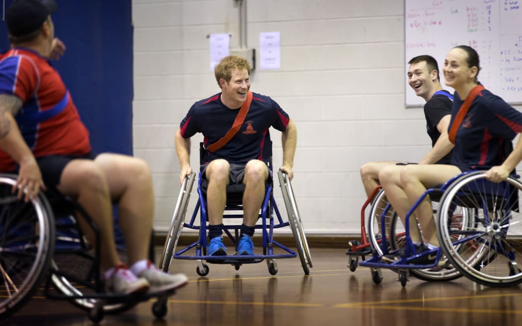 Prince Harry plays wheelchair AFL with members of the Soldier Recovery Centre in Darwin, Australia on 19 April.