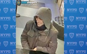 NYPD release photos of suspected gunman without mask