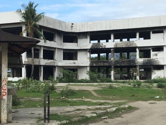Burnt buildings still litter Dili's landscape 15 years after Indonesia left
