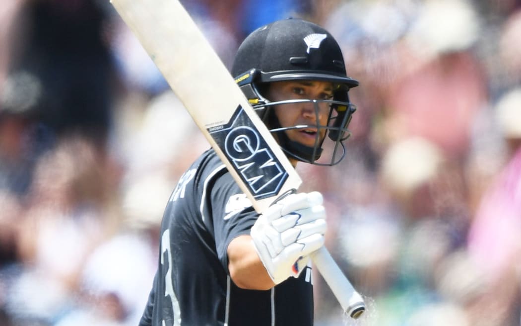 Ross Taylor salutes after scoring 50.