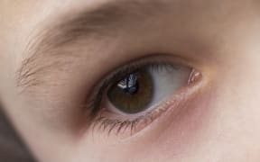 Close up macro of child boy eye