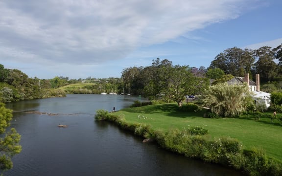 Kororipo Pā as seen from the other side of Kerikeri Basin with Kemp House, New Zealand’s oldest surviving building, on the right.
