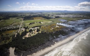 Canterbury fire crews have been battling a large scrub fire at Woodend beach. Helicopters and Planes got brought in to help fight the fire. 03 November 2022 New Zealand Herald Photograph by George Heard
