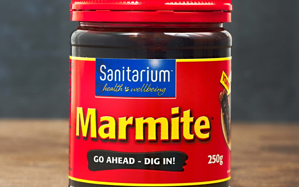 AUCKLAND, NEW ZEALAND - APRIL 02, 2016: A jar of Marmite, popular yeast extract product in New Zealand made by Sanitarium.