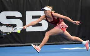 Caroline Wozniacki stretches for the ball at the ASB Tennis Centre