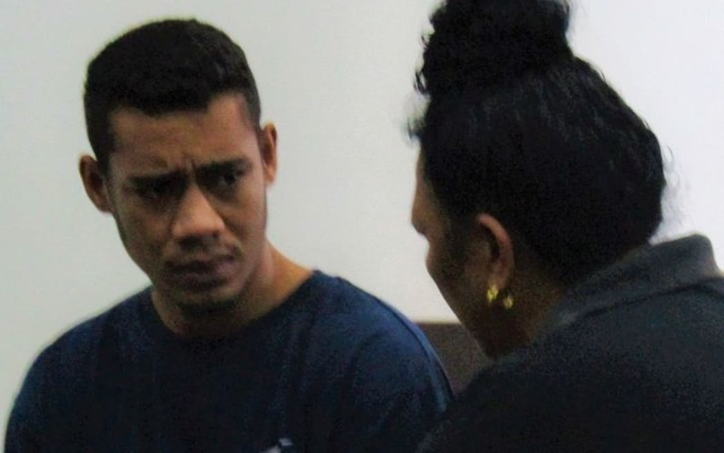 Aniseko Vaelei listening to his mother in court.