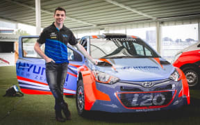 New Zealand rally driver Hayden Paddon with his NZ Hyundai rally car.