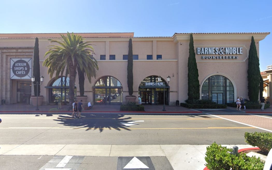 Newport Police Department said the suspects robbed a 69-year-old New Zealand woman and her husband outside the Barnes and Noble, according to CBS News.