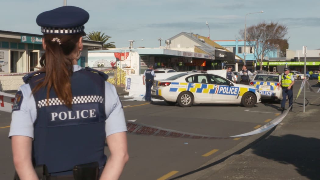 Police at the scene of a hit and run by a white van in New Brighton