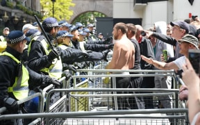 Members of far-right groups are pictured during protests against an expected Black Lives Matter demonstration in central London.