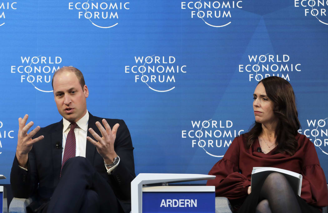 Prime Minister Jacinda Ardern listens as Prince William speaks while taking part in the Mental Health Matters panel at the World Economic Forum in Davos, Switzerland.