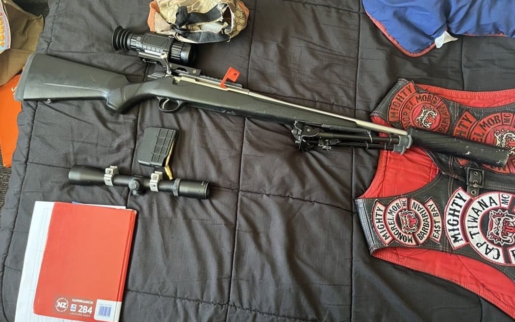 An image released by police showing one of the five rifles and 13 Mongrel Mob gang patches seized as part of Operation Highwater in October 2024.