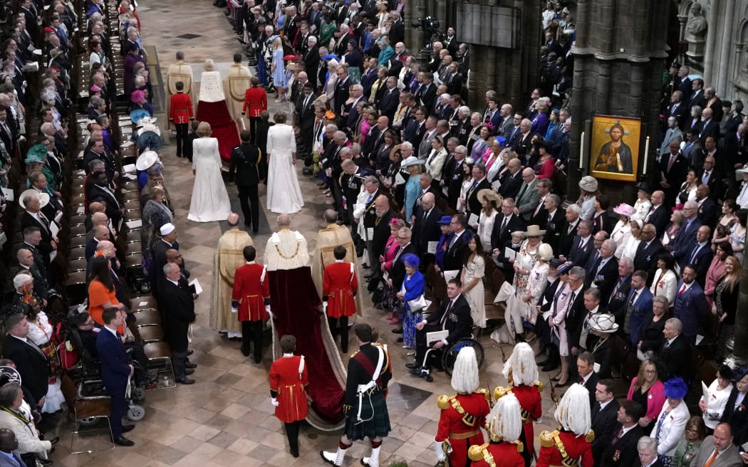 Britain's King Charles III and Britain's Camilla, Queen Consort arrive at Westminster Abbey, in central London on May 6, 2023, ahead of their coronations. - The set-piece coronation is the first in Britain in 70 years, and only the second in history to be televised. Charles will be the 40th reigning monarch to be crowned at the central London church since King William I in 1066. Outside the UK, he is also king of 14 other Commonwealth countries, including Australia, Canada and New Zealand. Camilla, his second wife, will be crowned queen alongside him and be known as Queen Camilla after the ceremony. (Photo by Kirsty Wigglesworth / POOL / AFP)