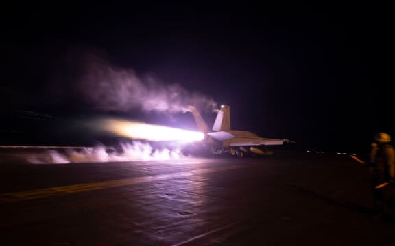 In this photo released by the US military's Central Command on January 22, 2024, US Central Command forces alongside UK Armed Forces, and with the support from Australia, Bahrain, Canada, and the Netherlands, conduct strikes on 8 Houthi targets in Iranian-backed Houthi terrorist-controlled areas of Yemen. The United States and Britain launched new strikes on Yemen's Huthis January 22, saying their second round of joint military action against the Iran-backed rebels was in response to continued attacks on shipping.
American and British forces carried out a first wave of strikes against the rebel group on January 11, and the United States launched further air raids against missiles that Washington said were ready to launch and posed a threat to both civilian and military vessels. (Photo by Handout / US Central Command (CENTCOM) / AFP) / RESTRICTED TO EDITORIAL USE - MANDATORY CREDIT "AFP PHOTO /  HANDOUT / CENTCOM " - NO MARKETING - NO ADVERTISING CAMPAIGNS - DISTRIBUTED AS A SERVICE TO CLIENTS