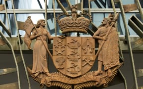 WELLINGTON, NEW ZEALAND - JUNE 12: A general view of the coat of arms at the Supreme Court on June 12, 2019 in Wellington, New Zealand. Internet entrepreneur Kim Dotcom is fighting extradition to the United States along with three of his former colleagues - Mathias Ortmann, Bram van der Kolk, and Finn Batat - over the file-sharing website Megaupload. The US Department of Justice has been trying to extradite the men since 2012 on charges of conspiracy, racketeering, and money laundering. An NZ district court permitted the extradition in 2015, leading the defendants to lodge unsuccessful appeals at the High Court and Court of Appeal, prior to this week's Supreme Court appeal. The FBI claims Mr. Dotcom's Megaupload site earned millions of dollars by facilitating illegal file-sharing, however, Dotcom and his co-defendants argue the site simply provided a place for users to store and share...