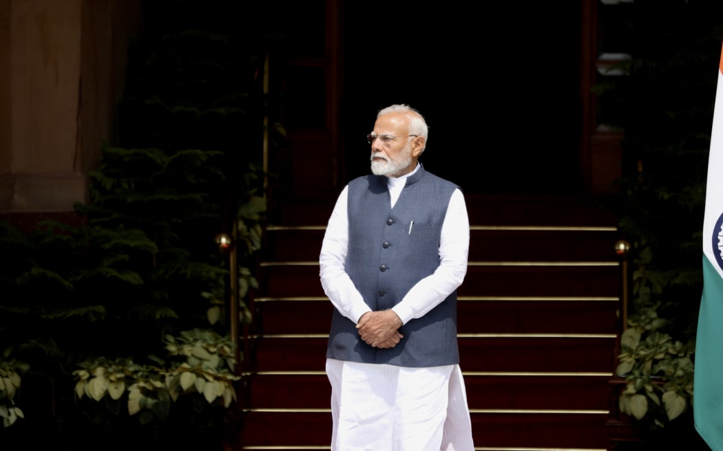 Prime Minister Narendra Modhi awaits the arrival of Christopher Luxon at Hyderabad House in New Delhi.