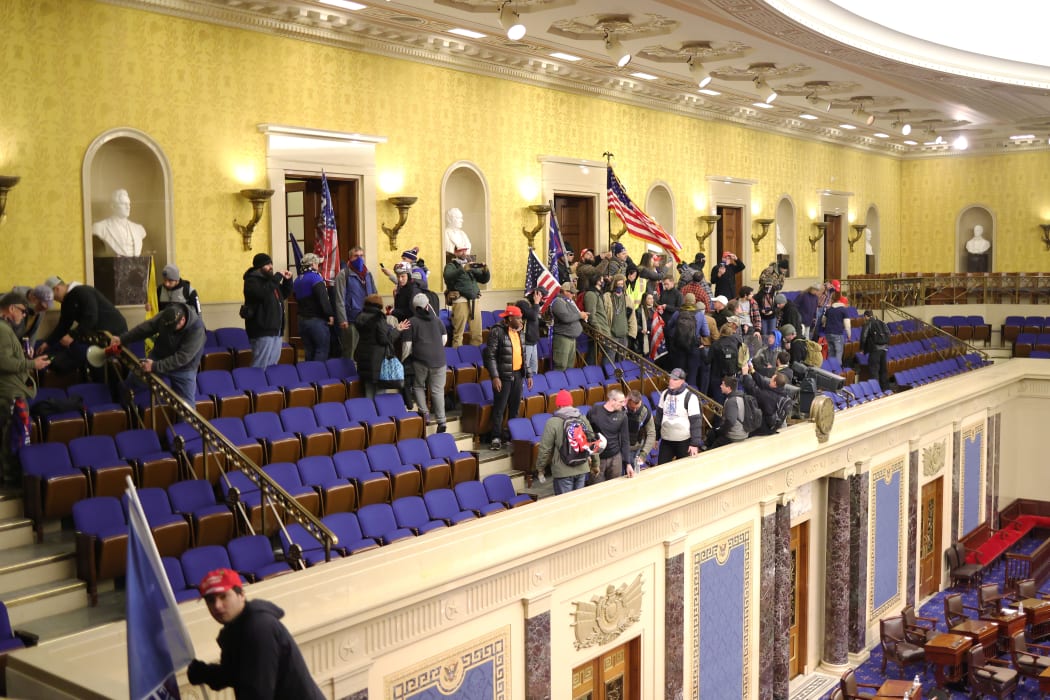 Protesters enter the Senate Chamber on January 06, 2021 in Washington, DC.