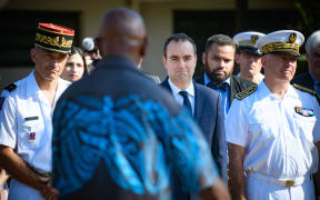 As part of his visit to New Caledonia for the South Pacific Defence Ministers Meeting (SPDMM), French Minister of Defence Sebastien Lecornu performs the customary greeting at the customary senate of New Caledonia. On his left, Louis Le Franc, High Commissioner of the French Republic in New Caledonia. On his right, Yann Latil, Commander of the FANC Forces Armees de la Nouvelle-Caledonie. Noumea, December 3, 2023. Photograph by Delphine Mayeur / Hans Lucas.
Dans le cadre de son deplacement en Nouvelle-Caledonie a l’occasion de la reunion des ministres de la Defense du Pacifique Sud (South Pacific Defence Ministers’ Meeting - SPDMM), le ministre des Armees Sebastien Lecornu effectue la coutume de bonjour au senat coutumier de Nouvelle-Caledonie. A sa gauche le Haut-commissaire de la Republique en Nouvelle-Caledonie, Louis Le Franc. A sa droite le commandant superieur des FANC Forces Armees de la Nouvelle-Caledonie, Yann Latil. Nouvelle-Caledonie, Noumea, 3 decembre 2023. Photographie par Delphine Mayeur /...